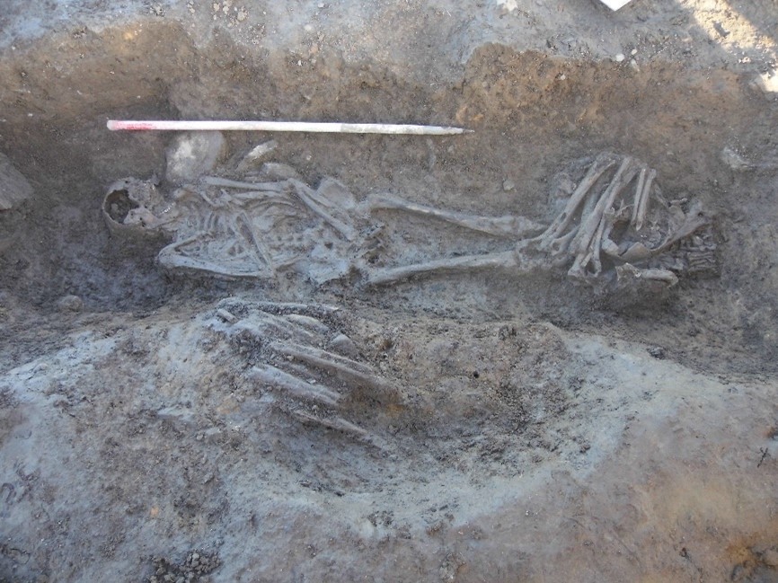 Inhumations within the rath ditch